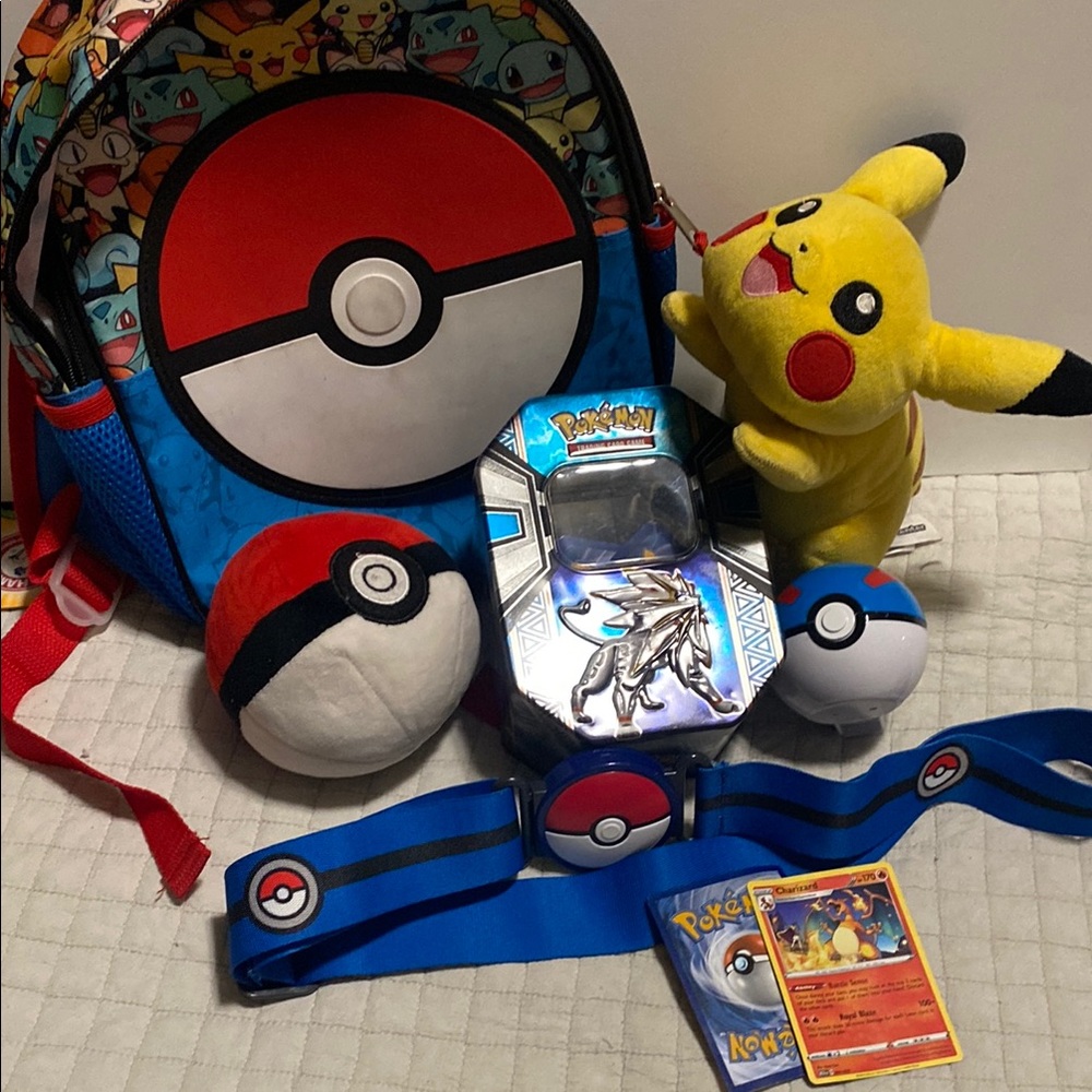 Pokemon pack : backpack, cards, Pikachu plush, belt, plush ball and storage ball